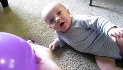 Cute Baby Laughing Hysterically At Deflating Balloon By His Mom