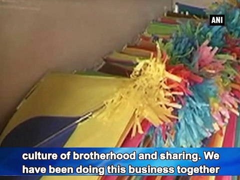 A Hindu and Muslim kite-maker work together in the state of Gujarat spreading harmony