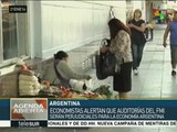 Economistas preocupados porque FMI podrá supervisar economía argentina