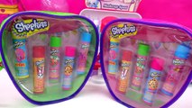 4 Flavored Shopkins Balm Single Packs and 2 zip cases with 5 Scented balms Cookiesw