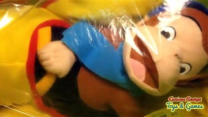 Curious George drives an Airplane Plush Toy