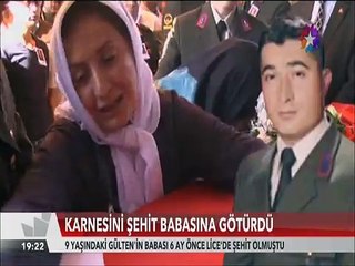 9 Yaşındaki Şehit kzı karnesini babasının mezarına götürdü