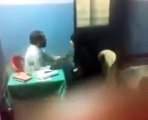 What is doctor doing with Female in his clinic