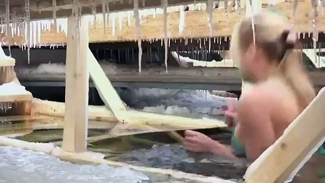 Raw: Russians Dip In Frigid Waters For Epiphany