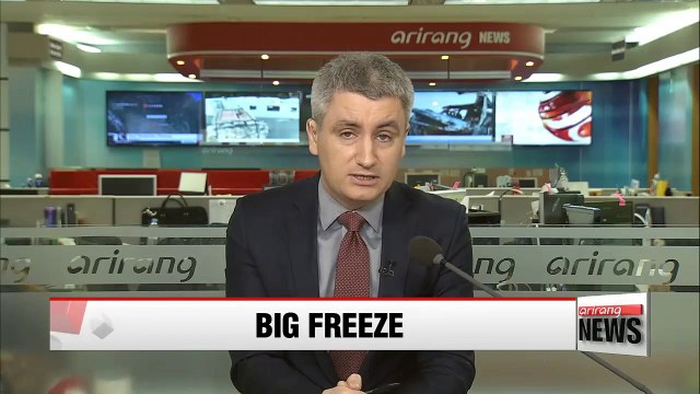 Korea, east coast of U.S. shiver under big freeze, snowstorm