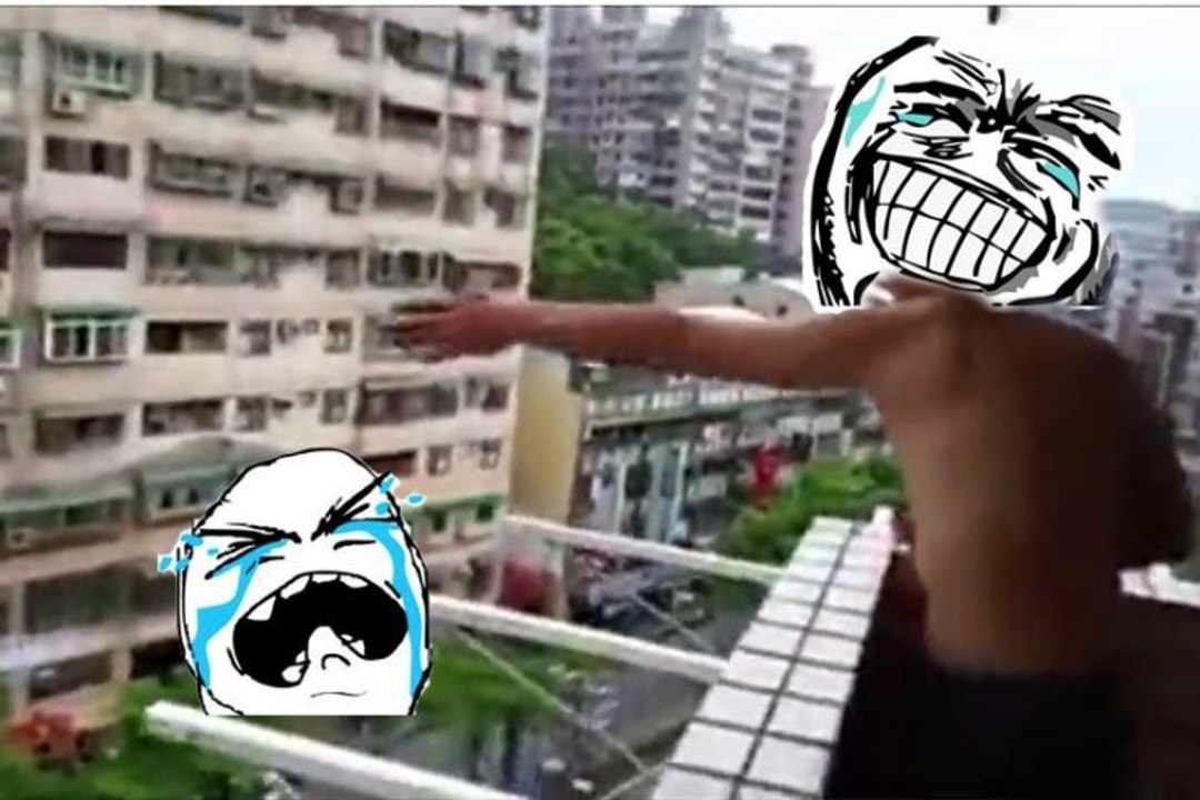 Man catches a fish from its balcony