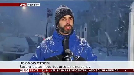 Blizzard2016 is affecting New York, demonstrated by an umbrella and a rule