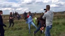 Camerawoman Blatently Trips Refugee Trying To Escape