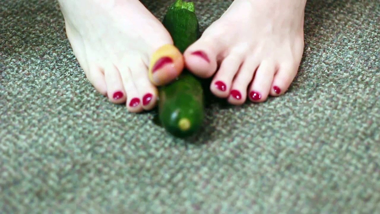 running my feet along a courgette - cd feet with vegetables :)