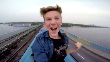 Guy Jumps on And Surfs a Subway Train