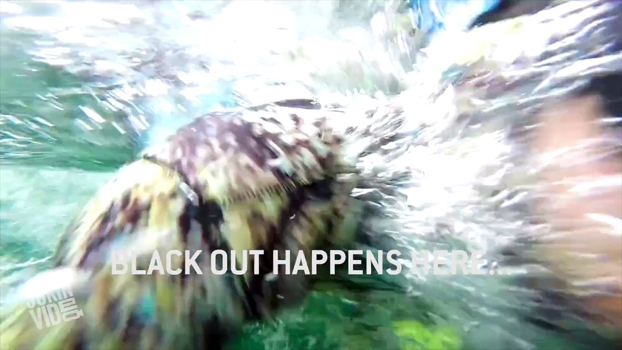 Guillaume Nery base jumping at Deans Blue Hole, filmed on breath hold by Julie Gautier