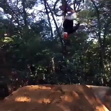 BMX Biker Lands Backflip After Several Faceplants