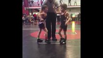 Boy fells his twin brother with a single surprise punch after losing a wrestling match to him