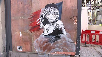 Banksy's Calais 'Jungle' teargas mural boarded up