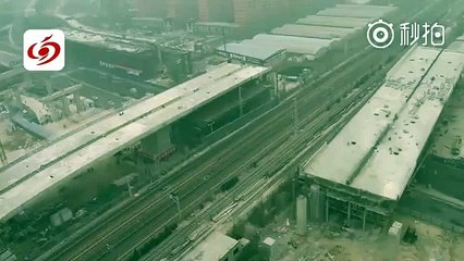 2 highway bridges in C China's Zhengzhou got lifted & turned 90° in merely 88 min