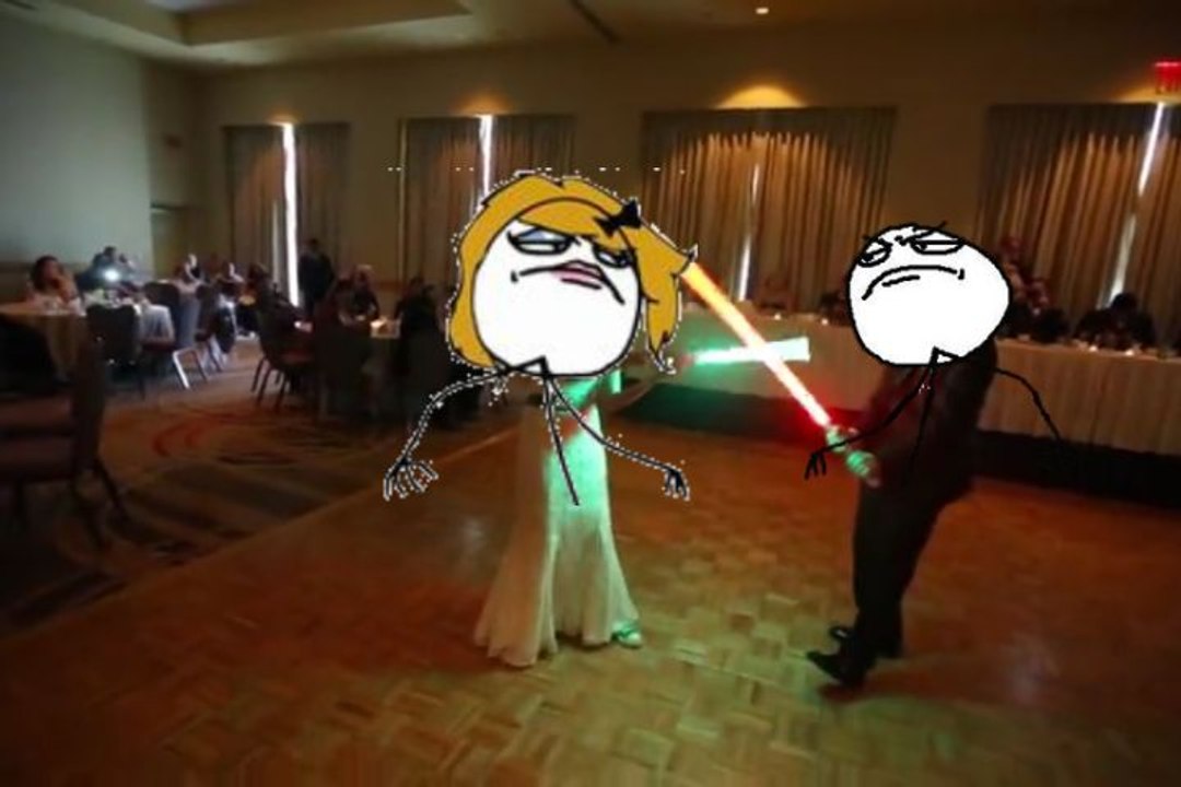 Bride and groom first dance lightsaber battle!