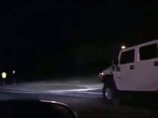 Crazy Hummer driver driving over the road signs and breaks them one by one