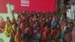 Local women gather outside Shani Shingnapur to bar women activists