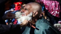 Tajikstan Shaves 13,000 Men's Beards To 'End Radicalism' (World Music 720p)