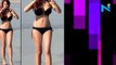 Amy Childs shows off her assets on the beach