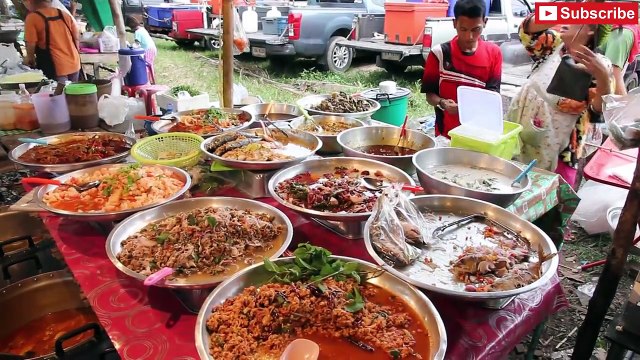 Cooking Thai Street Food_ Street Food Vendors in Thailand. Shopping at a Thai Food Market