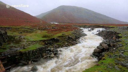 River levels rise rapidly as rain hits sodden ground in Cumbria, UK