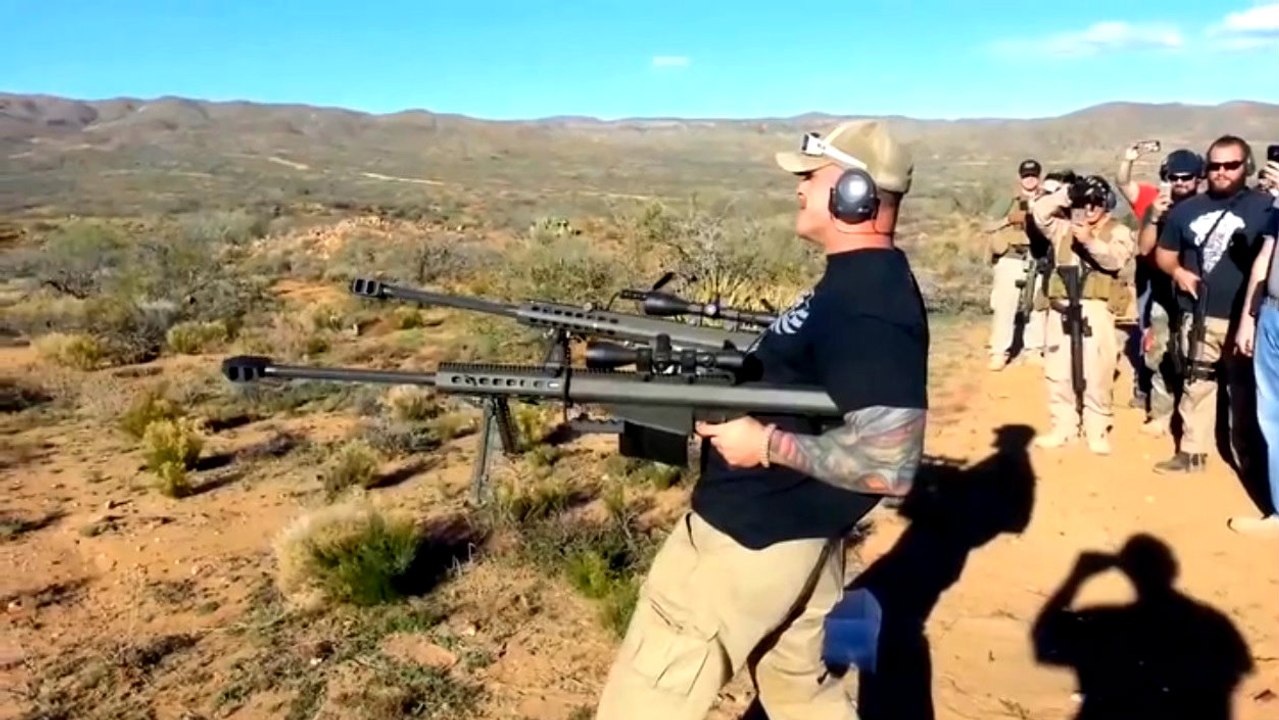 Dual Wielding Two Barrett 50 Cal Sniper Rifles
