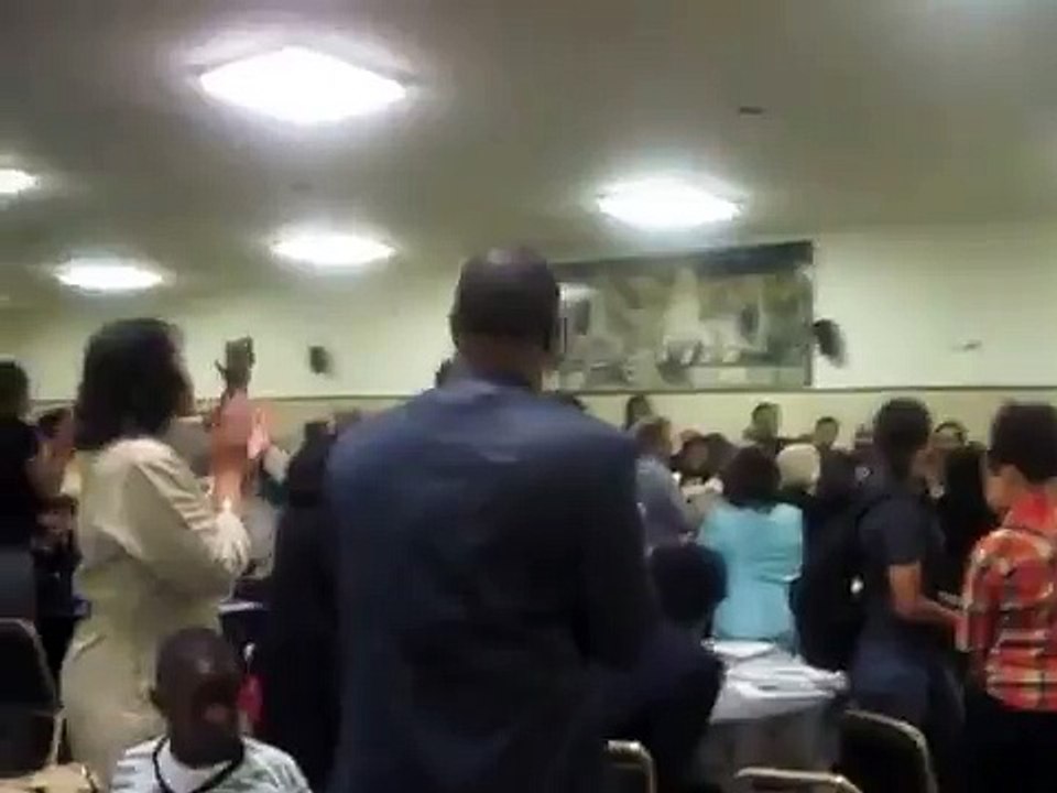 Marian K. Baker receives standing ovation at memorial for husband, General G. Baker, Jr.