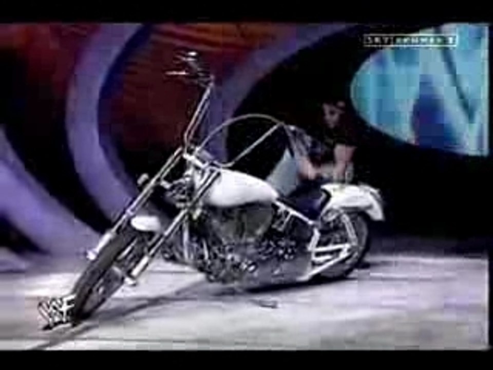 HHH destroys Taker's Bike