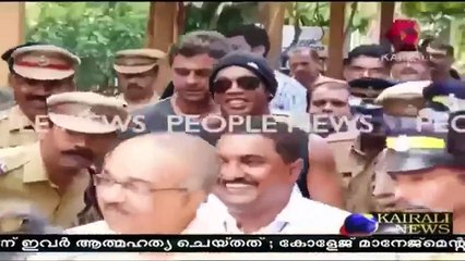 Ronaldinho narrowly avoids injury after a traffic light falls in front of his car