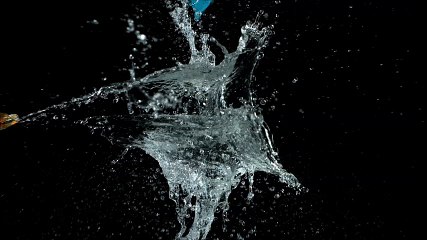 Popping a water balloon in slowmo