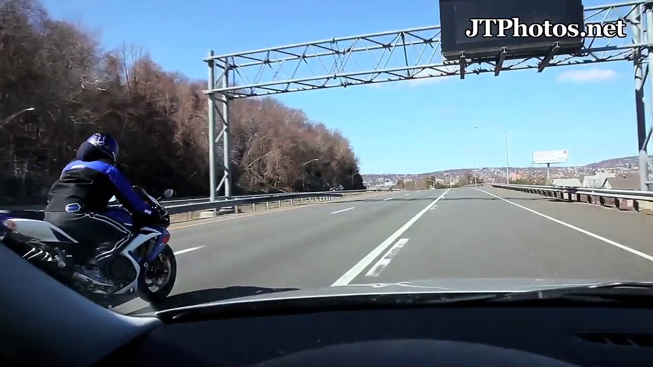 LOUD Corvette Z06 racing a street bike