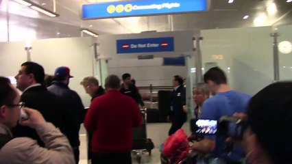 Kenneth Branagh And Wife Lindsay Brunnock Holding Hands At LAX