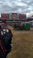 Broncos fan kicks over Porta Potty with patriots fan inside!