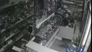 Store Owner Fights Back Against Robbers