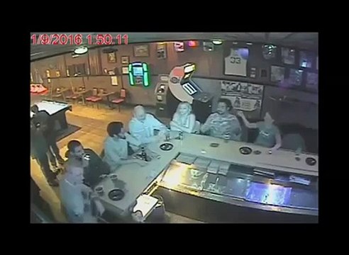 Dumb girl sets guy's hair on fire in a bar