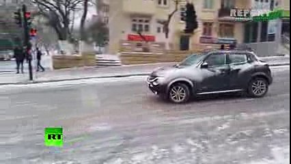 Ice tango Crazy chaotic traffic drift in Azerbaijan as streets turn into skate rink 2016