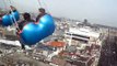 Sitting on 60 meters high attraction in Amsterdam