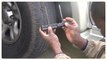 Tire repair movie.  Watch a couple of others on this subject first, but this is the best and easy way.This could be done without completely de-inflating the tire  ON THE SIDE OF A SAFE PLACE.. You can plug while there is still air -