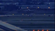 A plane lands during windy conditions Thursday at O'Hare International Airport  Crosswind Landing