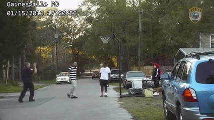 Officer plays basketball with teens following noise complaint