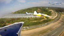 Three planes chained together pull off insane low pass stunt