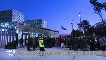 Gbagbo supporters gather outside Hague at start of trial