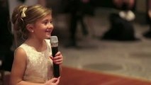 6-Year-Old Flower Girl Surprises Bride and Groom with Adorable Performance