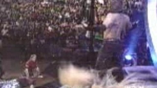 Jeff Hardy legdrops both Dudleys through tables