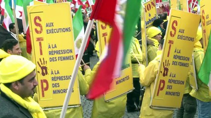 Hundreds in Paris protest Iranian president's visit to France