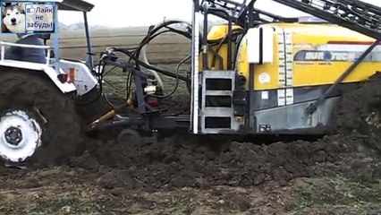 ЧТО ЗНАЧИТ ВМЕСТЕ Два трактора и трос