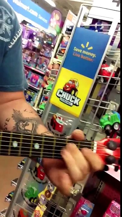 When This Guy Picks Up A Toy Guitar At Wal-Mart, You Will Be Impressed With What He Plays