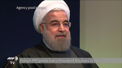 Iran President Rouhani greeted by French PM