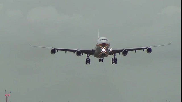 Crazy Surinam Airways A340-313 crosswind landing at Schiphol Airport! Crosswind Landing